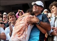 (king of clay Rafa embracing and acknowledging his coach and Uncle Toni after his victory).