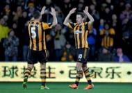HULL, ENGLAND- DECEMBER 28: James Chester and Robert Koren of Hull City celebrate after Robert Koren scores his 2nd goal during the Barclays Premier League match between Hull City and Fulham at KC stadium on December 28, 2013 in Hull, England. (Photo by Richard Sellers/Getty Images)