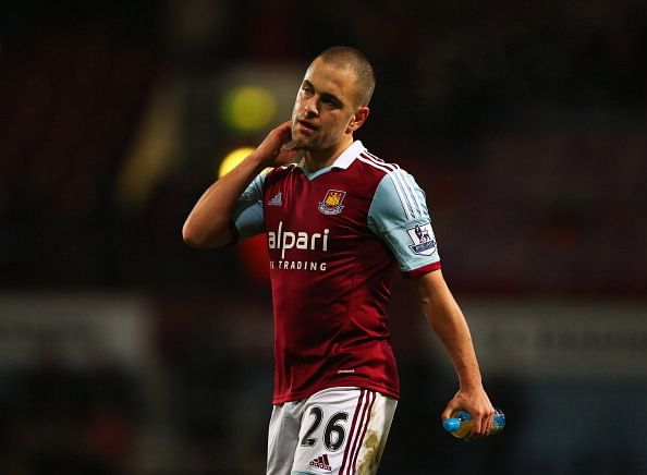 LONDON, ENGLAND - DECEMBER 26:  Joe Cole of West Ham United looks dejected in defeat after the Barclays Premier League match between West Ham United and Arsenal at Boleyn Ground on December 26, 2013 in London, England.  (Photo by Bryn Lennon/Getty Images)