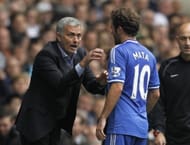 Chelsea's Portuguese manager Jose Mourinho (L) gestures to Chelsea's Spanish midfielder Juan Mata (R) during the English Premier League football match between Tottenham Hotspur and Chelsea at White Hart Lane in London on September 28, 2013. AFP PHOTO/ IAN KINGTON