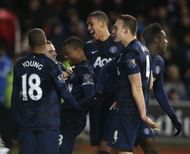 Patrice Evra celebrates his goal against Stoke City with his team-mates