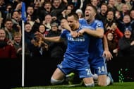 Chelsea's English defender John Terry (L) celebrates with Chelsea's English defender Gary Cahill