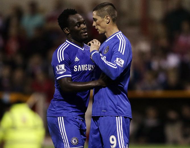 Essien arrives at Milan
