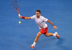 Australian Open 2014: Stanislas Wawrinka ends eternal pursuit with epic win over Novak Djokovic