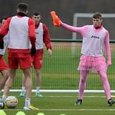 Scottish Premiership club forces player to train in pink morphsuit and skirt!