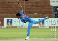 Indian bowler Jaidev Unadkat throws the ball during the final game of the 5 match cricket ODI series between Zimbabwe and India at the Queens Sports Club in Harare, on August 3, 2013. AFP PHOTO / JEKESAI NJIKIZANA (Photo credit should read JEKESAI NJIKIZANA/AFP/Getty Images)