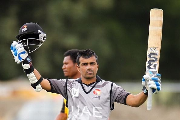 CHRISTCHURCH, NEW ZEALAND - JANUARY 26: Khurram Khan of UAE celebrates as he reaches his century during the ICC Cricket World Cup Qualifier match between UAE and PNG at Hagley Oval on January 26, 2014 in Christchurch, New Zealand. (Photo by Martin Hunter-IDI/IDI via Getty Images)