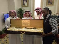 Kofi Kingston presented with a sword!