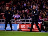 David Moyes manager of Manchester United (R) and coach Phil Neville (L) shout from the touchline during the Capital One Cup Semi-Final, first leg match between Sunderland and Manchester United at Stadium of Light on January 7, 2014 in Sunderland, England.