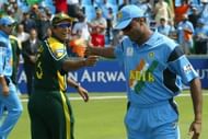 Wasim Akram of Pakistan and Javagal Srinath of India share a joke