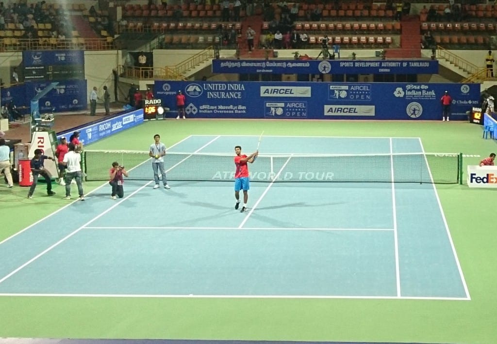 Yuki Bhambri doing the customary act of hitting the ball into the stands after his victory