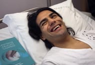 Falcao posing for the cameras in the hospital
