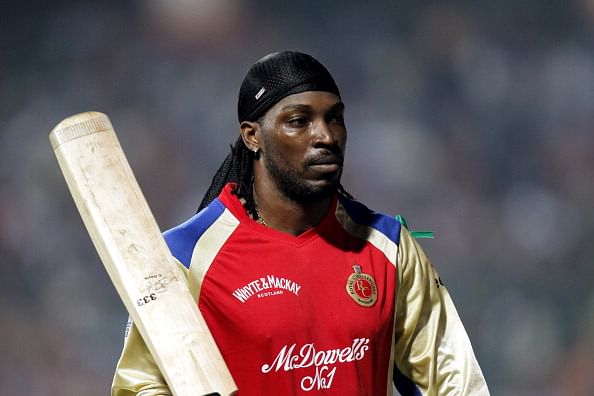 BANGALORE, INDIA - OCTOBER 3:  Royal Challengers Bangalore batsman Chris Gayle walks back to the pavillion after being declared out for 86 runs off just 46 balls during the Champions League Twenty20 Group B match between Royal Challengers Bangalore and Somerset at M. Chinnaswamy Stadium on October 3, 2011 in Bangalore, India.  (Photo by Vijayanand Gupta/Hindustan Times via Getty Images)