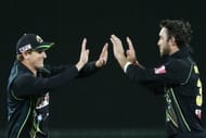 HOBART, AUSTRALIA - JANUARY 29: George Bailey (L) and Glenn Maxwell of Australia celebrate the wicket of Eoin Morgan of England during game one of the International Twenty20 series between Australia and England at Blundstone Arena on January 29, 2014 in Hobart, Australia. (Photo by Michael Dodge/Getty Images)