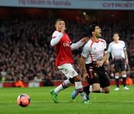 Suarez is fouled by Oxlade-Chamberlain