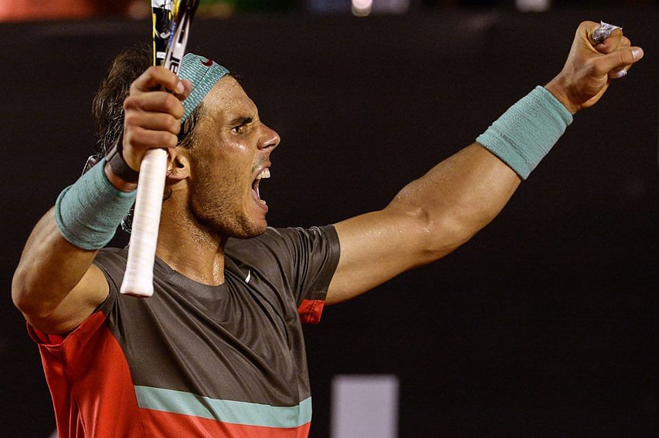 Rafael Nadal celebrates his Rio Open victory over Alexandr Dolgopolov