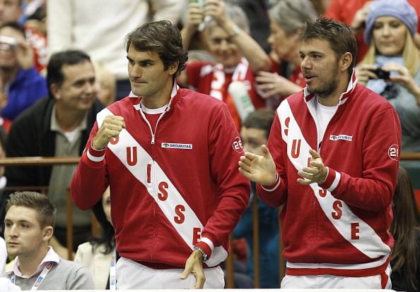 Roger Federer and Stanislas Wawrinka, cheerleaders for the Switzerland Davis Cup team