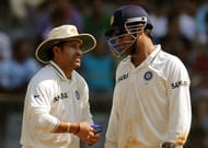 Indian captain Mahendra Singh Dhoni (R)