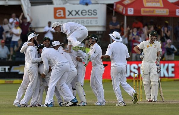 South Africa&#039;s cricketers (L) celebrate their win over Australia in the second test match between South Africa and Australia at St George&#039;s Park in Port Elizabeth on February 23, 2014. AFP PHOTO / ALEXANDER JOE        (Photo credit should read ALEXANDER JOE/AFP/Getty Images)