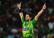 Pakistan cricketer Shahid Afridi celebrates after he dismissed Sri Lankan cricketer Tillakaratne Dilshan during the second and final Twenty20 match between Sri Lanka and Pakistan at the Suriyawewa Mahinda Rajapakse International Cricket Stadium in the southern district of Hambantota on June 3, 2012. AFP PHOTO/ LAKRUWAN WANNIARACHCHI (Photo credit should read LAKRUWAN WANNIARACHCHI/AFP/GettyImages)