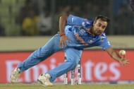 Indian cricketer Amit Mishra dives to catch a ball during the ICC World Twenty20 tournament cricket match between India and Australia at The Sher-e-Bangla National Cricket Stadium in Dhaka on March 30, 2014. AFP PHOTO/Munir uz ZAMAN (Photo credit should read MUNIR UZ ZAMAN/AFP/Getty Images)