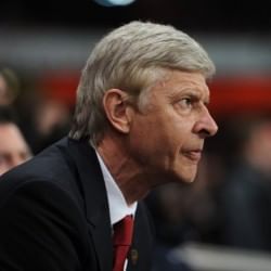 Arsene Wenger hits back at Paul Scholes' comments over Arsenal's title challenge