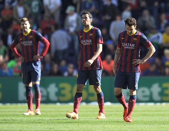 Barcelona players react to Valladolid scoring the first goal against them