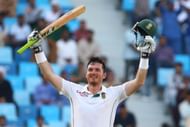 South African captain Graeme Smith celebrates a double century during the second day of the second Test Match between Pakistan and South Africa at the Dubai International Cricket Stadium October 24, 2013. AFP PHOTO/ MARWAN NAAMANI (Photo credit should read MARWAN NAAMANI/AFP/Getty Images)