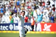 South Africa's captain Graeme Smith salutes the crowd after playing his last international Test on Day 4 of the third Test match between South Africa and Australia at Newlands on March 3, 2014 in Capetown. AFP PHOTO / Luigi Bennett (Photo credit should read Luigi Bennett/AFP/Getty Images)