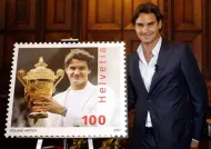 In 2007, Roger Federer became the first living Swiss person to be featured on a Swiss stamp. The postage picture features Roger holding the Wimbledon trophy.