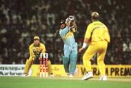 27 Feb 1996: Sachin Tendulkar of India plays a shot off the bowling of Shane Warne of Australia during the Cricket World Cup match between Australia and India in Bombay, India. Mandatory Credit: Shaun Botterill/Allsport