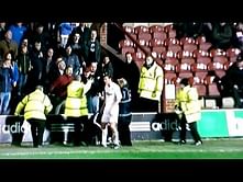 Crawley Town defender Paul Connolly punches fan on sidelines