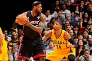 LeBron James #6 of the Miami Heat controls the ball against Paul George #24 of the Indiana Pacers on March 10, 2013 at American Airlines Arena in Miami, Florida.