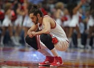Joakim Noah #13 of the Chicago Bulls takes a moment to himself before the start of a game against the Orlando Magic at the United Center on April 14, 2014 in Chicago, Illinois. The Bulls defeated the Magic 108-95.