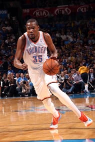 Kevin Durant #35 of the Oklahoma City Thunder drives to the basket against the Detroit Pistons on April 16, 2014 at the Chesapeake Energy Arena in Oklahoma City, Oklahoma.
