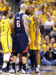 Pero Antic #6 of the Atllanta Hawks and David West #21 of the Indiana Pacers square off in Game 1 of the Eastern Conference Quarterfinals during the 2014 NBA Playoffs at Bankers Life Fieldhouse on April 19, 2014 in Indianapolis, Indiana