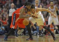 Washington forward Nene (42),left, steals the ball from Chicago center Joakim Noah (13) and goes for a 2nd half score as the Washington Wizards defeat the Chicago Bulls 102 - 93 in game 1 of the Eastern Conference quarter finals at the United Center in Chicago IL, April 20, 2014.
