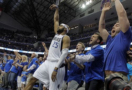 The Dallas Mavericks' Vince Carter (25) watches his game-winning 3-point shot fall against the San Antonio Spurs in Game 3 of of a Western Conference quarterfinal at the American Airlines Center in Dallas.  Carter's 3-pointer as time expired lifted the Mavs to a 109-108 win and a 2-1 series lead.