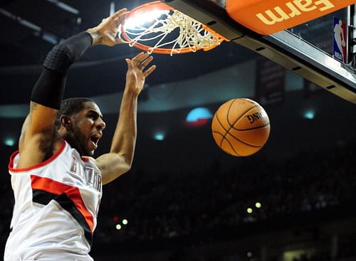 LaMarcus Aldridge #12 of the Portland Trail Blazers dunks the ball in the second half of Game Four of the Western Conference Quarterfinals against the Houston Rockets during the 2014 NBA Playoffs at the Moda Center on April 27, 2014 in Portland, Oregon. The Blazers won the game 123-120.