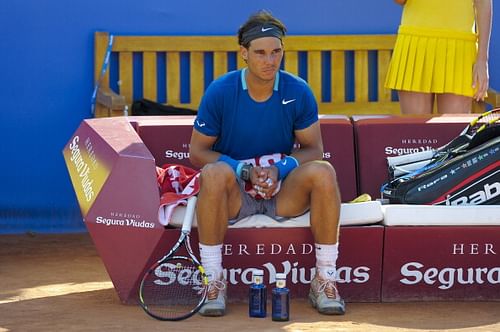 Rafael Nadal cut a forlorn figure during his loss to Nicolas Almagro in Barcelona