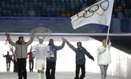 Indian athletesluger Shiva Keshavan, Alpine skier Himanshu Thakur and cross-country skier Nadeem Iqbal, labelled as Independent Olympic participants (Shiva Kesavan - third from left) march under IOC flag during the opening ceremony of the 2014 Winter Olympics in Sochi, Russia