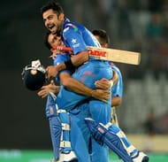 Yuvraj Singh lifts Virat Kohli up after the win