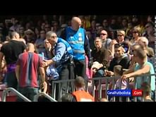 Real Madrid fan escorted away from Camp Nou during Barcelona's match against Getafe