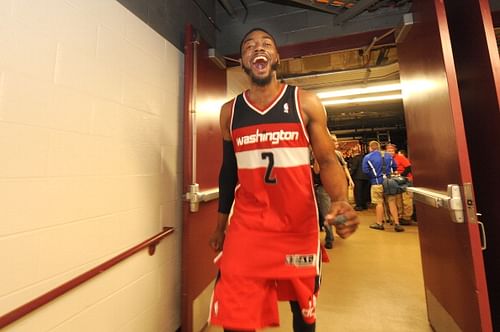 John Wall #2 of the Washington Wizards celebrates after Game 5 of the Eastern Conference Quarterfinals against the Chicago Bulls in the 2014 NBA Playoffs on April 29, 2014 at the United Center in Chicago, Illinois.