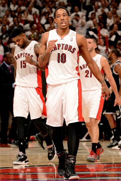 DeMar DeRozan #10 of the Toronto Raptors celebrates during a game against the Brooklyn Nets in Game Five of the Eastern Conference Quarterfinals during the 2014 NBA Playoffs at the Air Canada Centre on April 30, 2014 in Toronto, Ontario, Canada. 