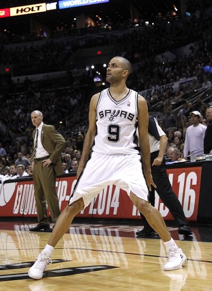 Tony Parker #9 of the San Antonio Spurs watches as his shot drops against the Dallas Mavericks in Game Seven of the Western Conference Quarterfinals during the 2014 NBA Playoffs at the AT&T Center on May 4, 2014 in San Antonio, Texas.