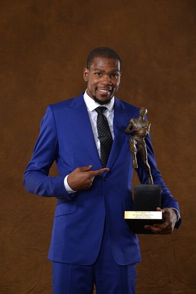 Kevin Durant of the Oklahoma City Thunder poses for a portrait with the Maurice Podoloff Trophy after being named the 2013-14 KIA Player of the Year on May 6, 2014 at the Thunder Events Center in Edmond, Oklahoma.