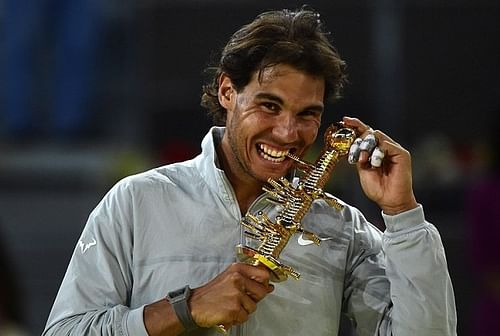 Rafael Nadal with his 'bite' of the Madrid Masters