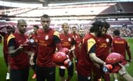 Galatasaray players with their helmets to commemorate the ones who lost their lives following the coal mine fire in Soma, Manisa on May 13, 2014, prior to the match with Kayseri Erciyesspor at Ali Sami Yen Sports Complex on May 17, 2014.