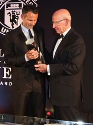 Ryan Giggs (right) is presented with the Lifetime Achievement award by Sir Bobby Charlton